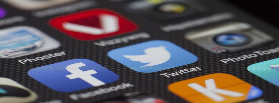 Canva - Iphone Displaying Social Media Application